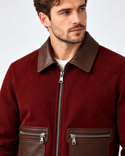 Close-up view of men's burgundy suede leather zip up bomber jacket details
