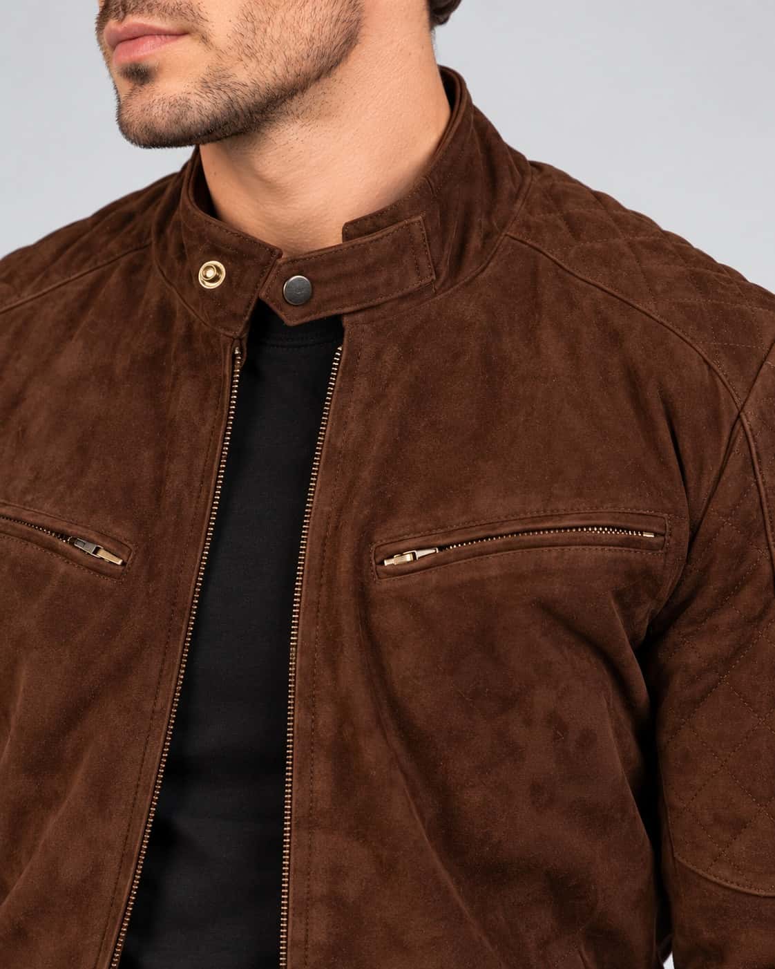 Close-up view of Men’s Chocolate Brown Suede Bomber Jacket with Quilted Shoulders