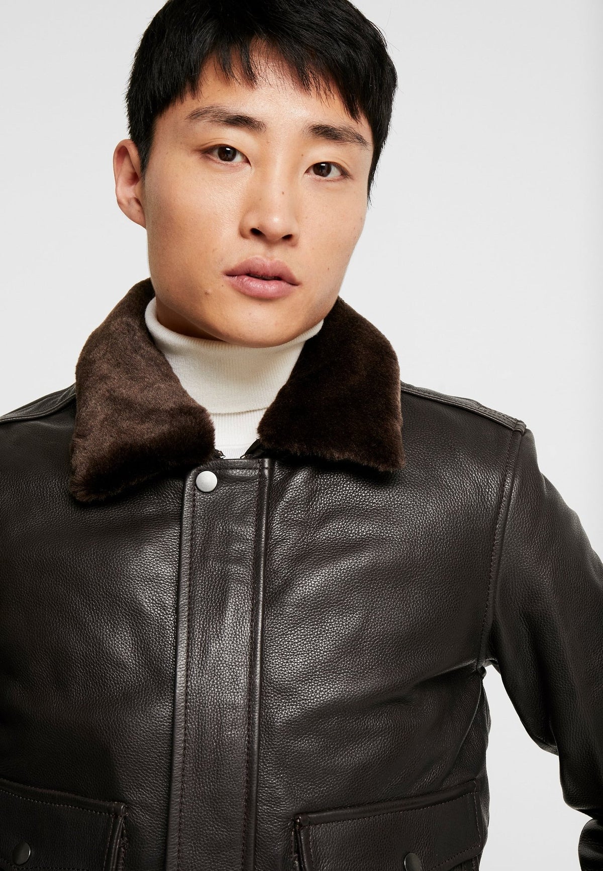 Men's Dark Brown Leather Bomber Jacket with Fur Collar Closeup view - Rugged Elegance