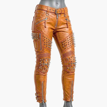 Best orange studded leather pants for women with skinny biker fit and metal spike detailing