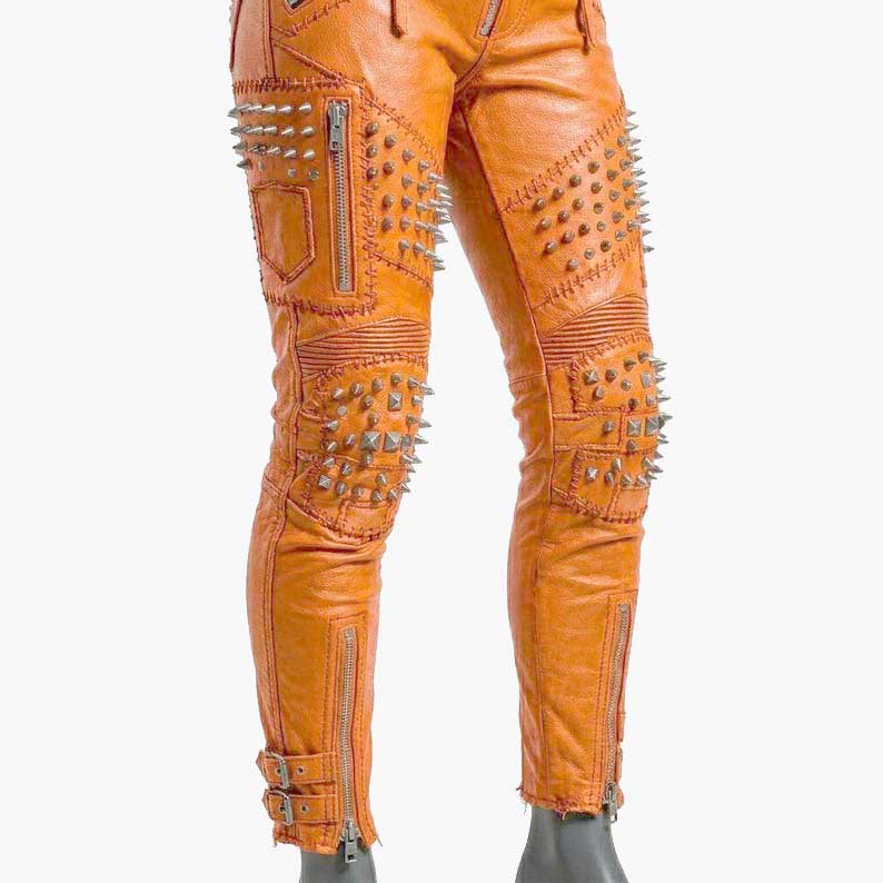 Premium orange studded leather pants for women crafted from genuine leather with durable stitching