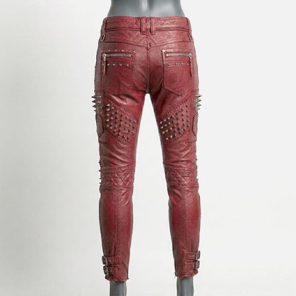 Stylish red studded leather biker pants for sale featuring zipper accents and punk rock design