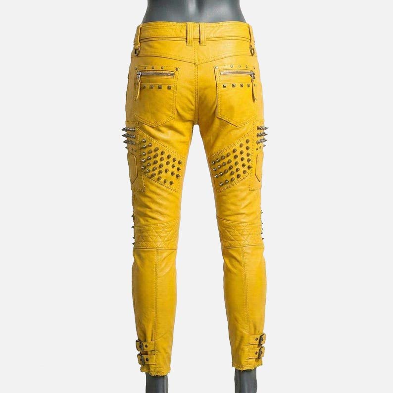 Stylish yellow studded leather biker pants for sale featuring zipper accents and punk rock design